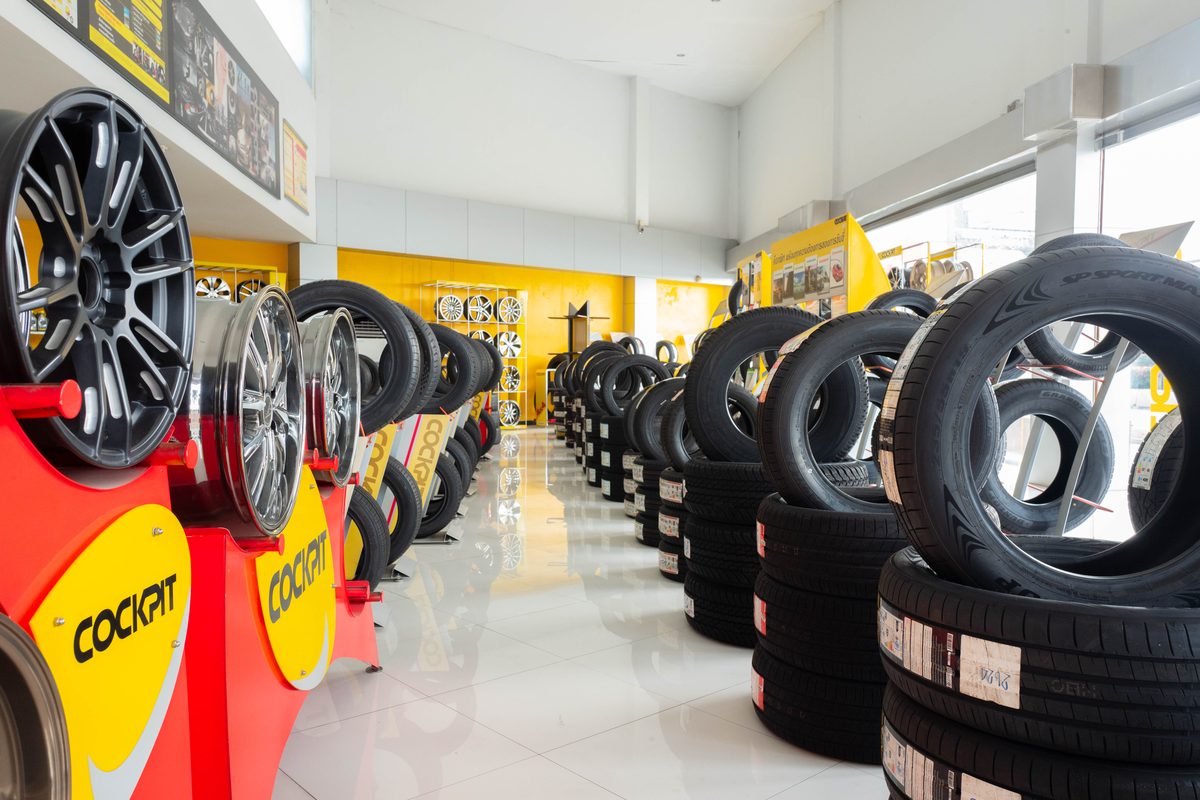 Subphaisal tire and alloy wheel showroom with stock in rows
